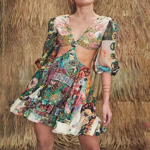 Bohemian floral mini dress with deep V-neck, waist cutout and puff sleeves for summer