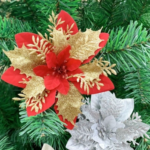 Three-layer artificial Christmas flowers with red and gold glitter on green pine branches