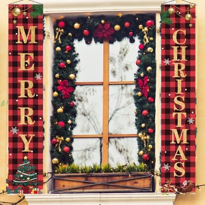 Detail of red and black plaid Christmas door banners with golden Merry Christmas text