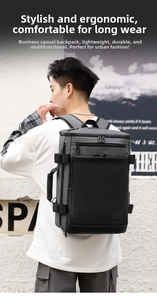Close-up of waterproof grey and black business backpack with large capacity top opening