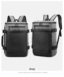 Detail view of water-resistant gray business backpack with side buckles and wide straps