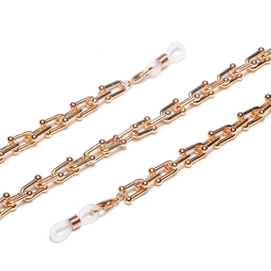 Minimalist gold-plated eyewear chain with polished U-shaped links and silicone loops