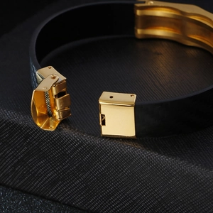 Men's black woven leather bracelet with golden stainless steel magnetic buckle clasp