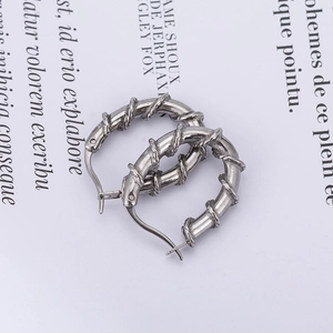 Vintage silver titanium steel hoop earrings with twisted rope texture for men
