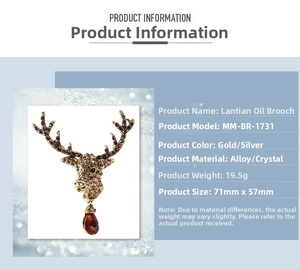 Detail view of vintage rhinestone reindeer brooch with a red drop pendant and dimensions