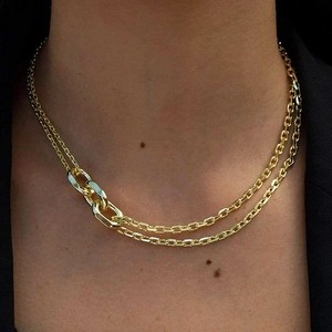 Double-layered gold chain necklace for women featuring minimalist circular ring pendants