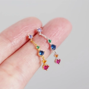 Detail shot of long S925 silver fringe earrings with five-color round cubic zirconia