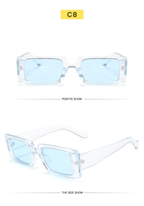 Macro view of clear rectangular frames and light blue lenses showing the side hinge detail