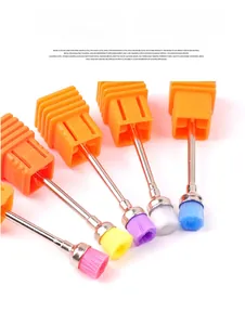 Close-up of 5 colorful nylon nail drill bit cleaning brushes with metal handles