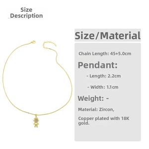 Detail of 18K gold plated copper necklace featuring a zircon boy pendant with size specs