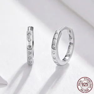 Minimalist S925 sterling silver hoop earrings with shimmering round cubic zirconia stones