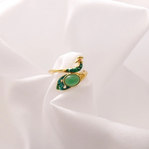 Vintage golden peacock open ring with blue-green enamel and emerald-like gemstone