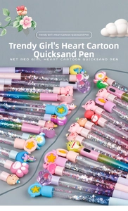 Close-up of glitter pens with colorful moving quicksand and cute cartoon toppers