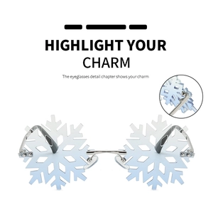 Detailed view of light blue snowflake lenses and silver metal frame for party sunglasses
