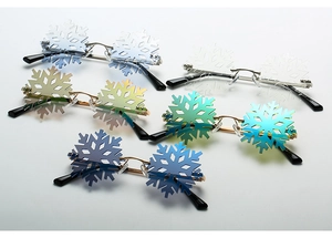 Frameless snowflake sunglasses in silver, blue, and green showing metallic temples