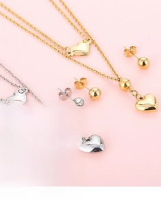 Minimalist jewelry set with heart pendant necklace and ball studs in gold and silver