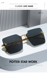 Nahaufnahme der randlosen Sonnenbrille mit Farbverlauf, Goldgestell und Logo-Detail