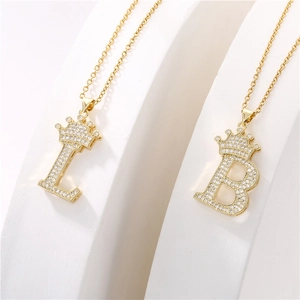 Gold plated crown letter necklace featuring micro-set zircon L and B pendant charms