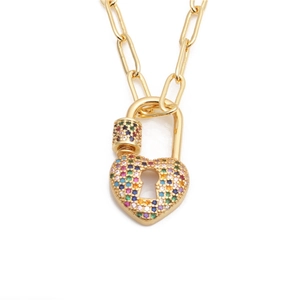 Golden paperclip chain necklace featuring a heart lock pendant with colorful zircon stones