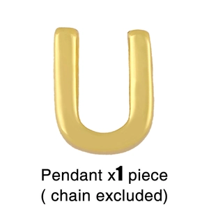 Detailed view of polished golden letter U pendant with smooth metallic texture
