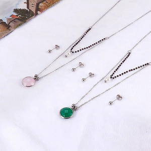 Dual layer titanium steel necklace and earring set with pink and green gemstones
