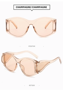Detail view of champagne oversized punk sunglasses with butterfly wing frames from multiple angles