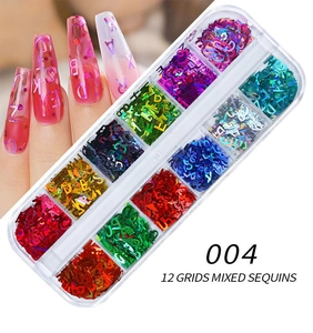 Close-up of 12-grid laser letter nail sequins set with colorful metallic glitter effects