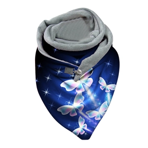 Detail of winter infinity scarf featuring blue butterfly print and soft grey fleece lining