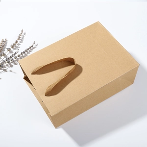 Vertical brown kraft paper gift bag with durable rope handles and lavender decoration