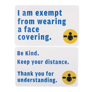 Detail of white medical exemption ID cards with daisy design for mask wearing status