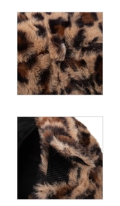 Detail of leopard faux fur texture with adjustable velcro strap and black lining