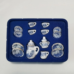 15-piece dollhouse miniature ceramic tea set with blue floral pattern on display tray