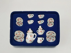 Top view of 15-piece miniature cherry ceramic tea set with blue flocking tray