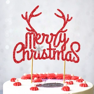 Sparkly red glitter Merry Christmas cake topper with reindeer antlers on gold stands