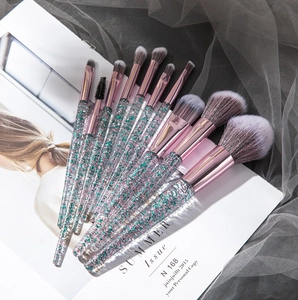Detail of 12pcs glitter liquid sand makeup brushes with transparent rose gold handles