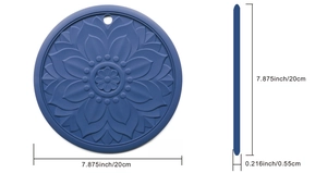 Detail of dark blue heat resistant silicone mat with lotus relief and size dimensions