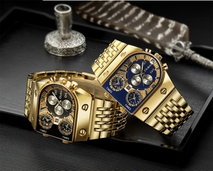 Detail of Oulm multi-timezone gold watches with black and blue square dials