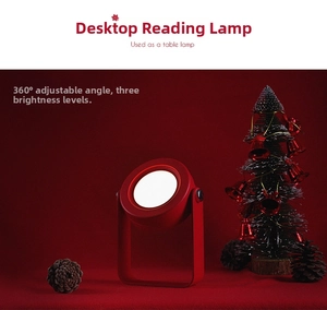 Deep red foldable lantern desk lamp with 360 rotation in Christmas holiday setting