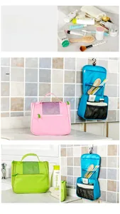 Macro detail of hanging travel toiletry bag with multiple mesh compartments and hooks