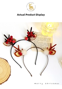 Detailed close-up of cute Christmas reindeer antler headbands with pine cones and fur balls