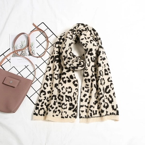 Thick leopard print knit scarf for women in warm beige and black animal pattern