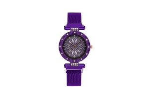 Detail of purple quartz watch featuring a floral dial with crystal markers and mesh strap
