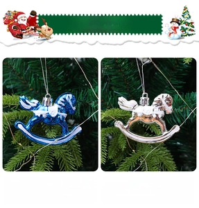 Detail of blue and silver Christmas rocking horse ornaments with glitter on a tree