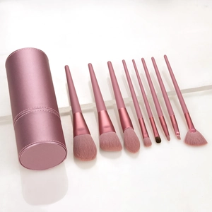 Pink 9-piece professional makeup brush set with matching storage cylinder case