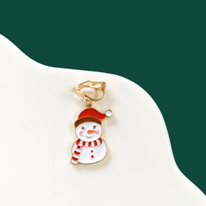 Detail of Christmas snowman ear clip with festive red scarf and comfortable white pad