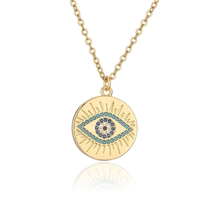 Gold plated evil eye pendant necklace featuring micro-set blue and white cubic zirconia