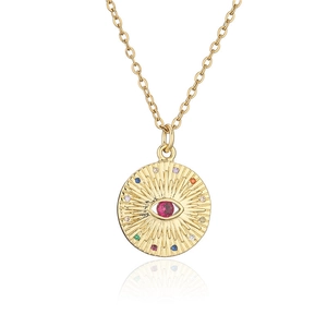 Macro shot of gold-plated geometric disc necklace featuring zircon-inlaid evil eye pendant