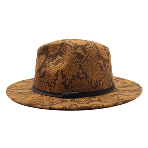 Detailed texture of ginger snake print fedora hat with a black decorative ribbon band