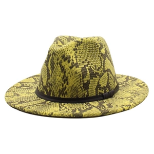 Fashionable yellow snakeskin print fedora hat with wide brim and black ribbon band