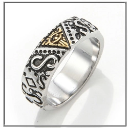 Detail view of vintage steel ring showing All Seeing Eye totem and intricate gold accents